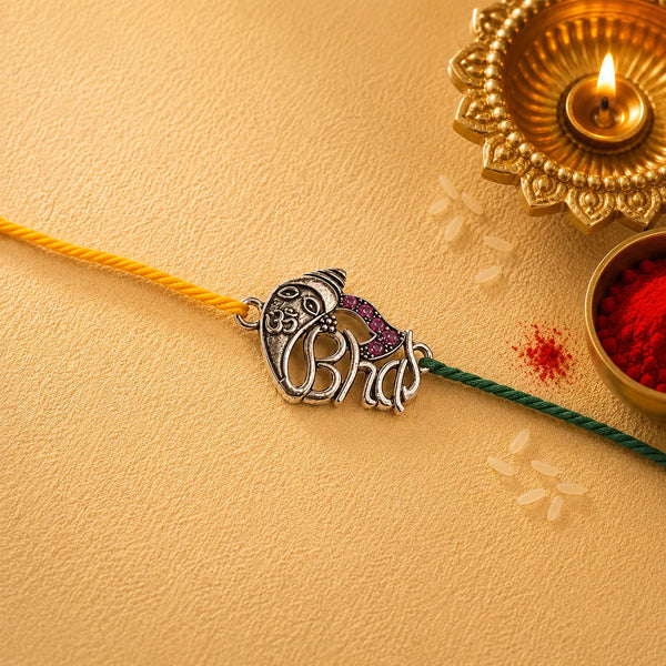 Om Ganesha Silver Rakhi with Purple Stones