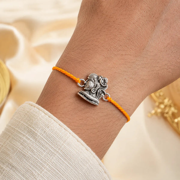 Shiv Parvati Silver Rakhi with Orange Thread