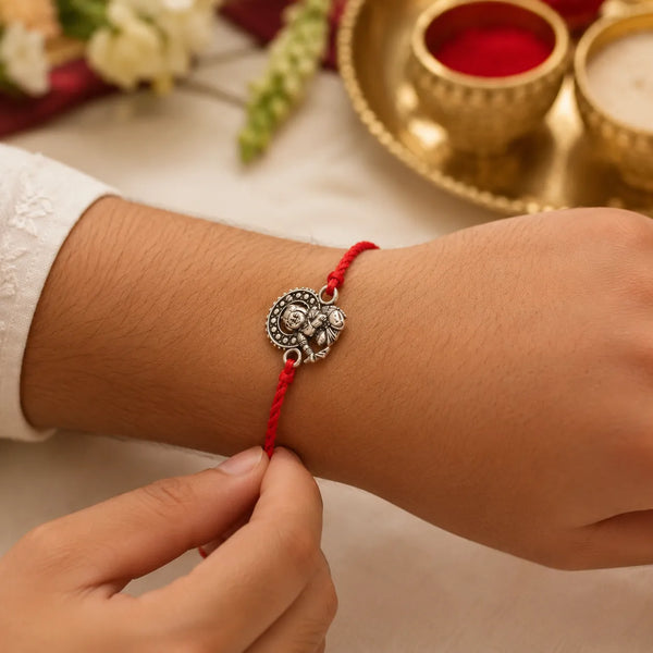 Bal Hanuman Silver Rakhi with Red Thread