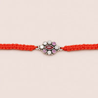 Royal Ruby Floral Silver Rakhi for Raksha Bandhan by Frolic Jewels