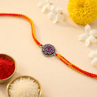 Ruby Bloom Silver Rakhi with Floral Design for Raksha Bandhan by Frolic Jewels