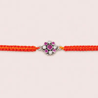 Ruby and White Crystal Floral Silver Rakhi for Raksha Bandhan by Frolic Jewels